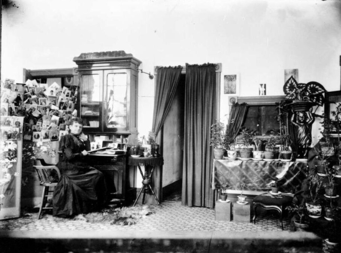 Hannah Hatherley Maynard at her desk in the parlour of the Maynard home