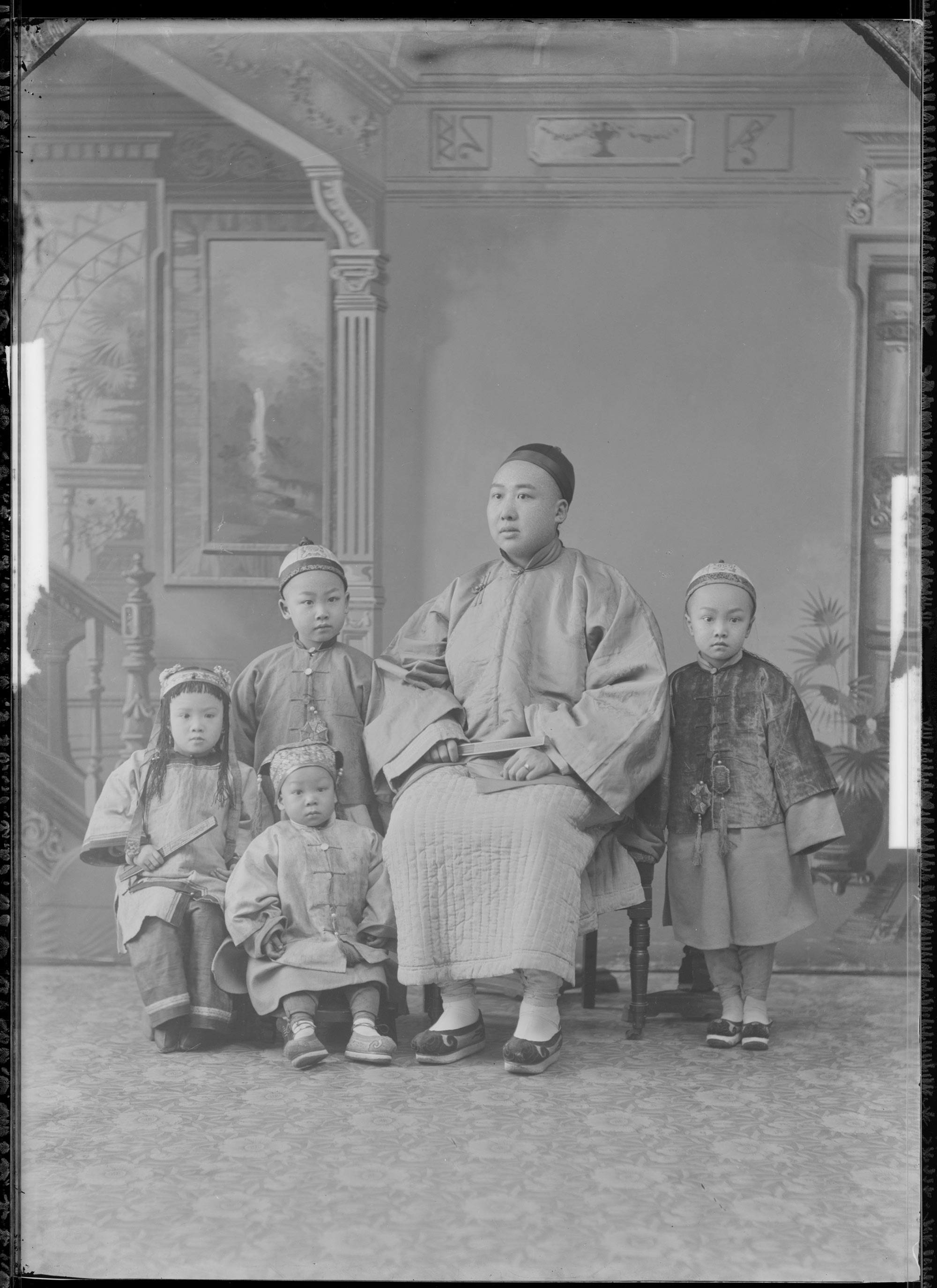 A black and white portrait of a family.