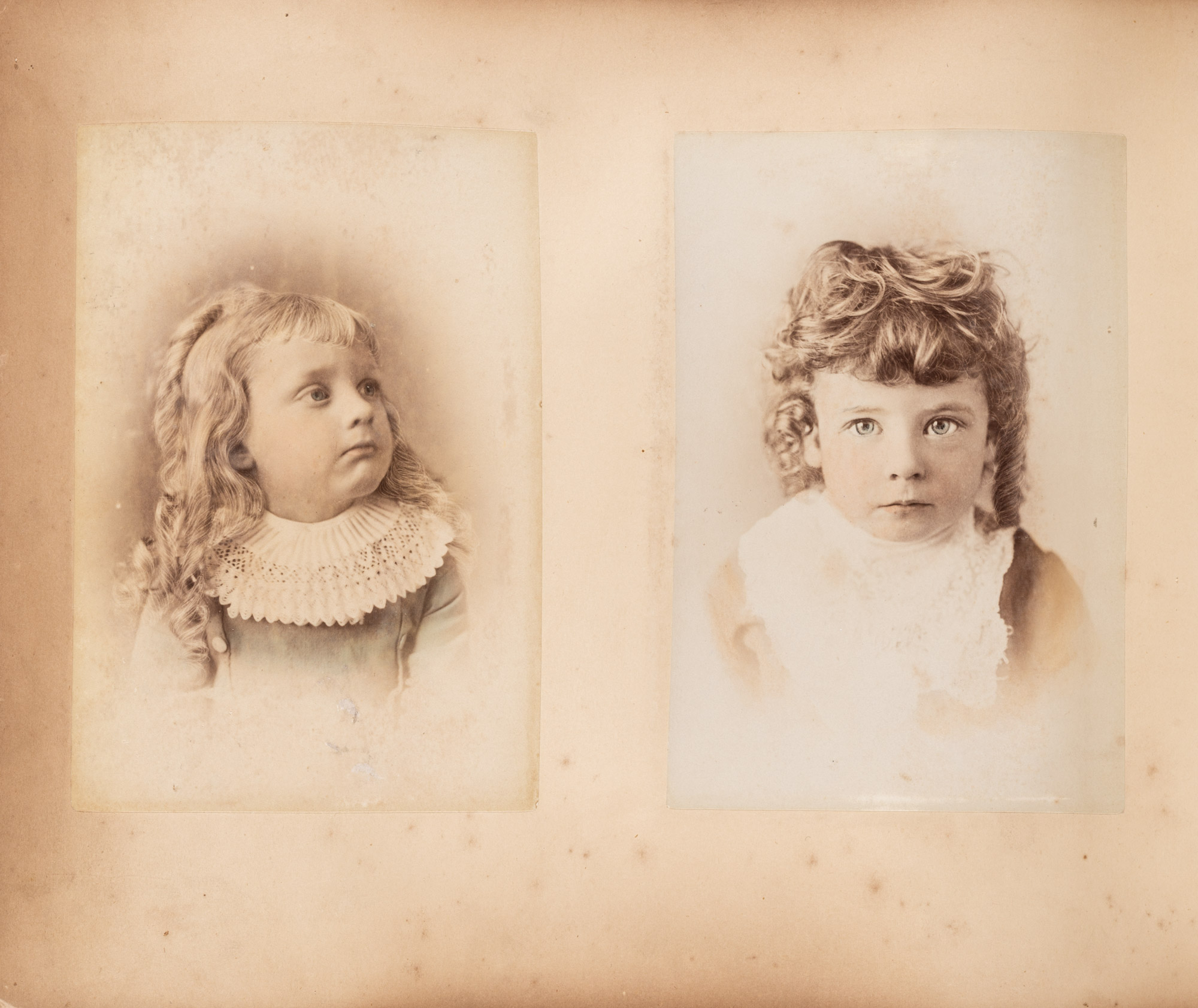 Sepia toned portrait of two small girls.